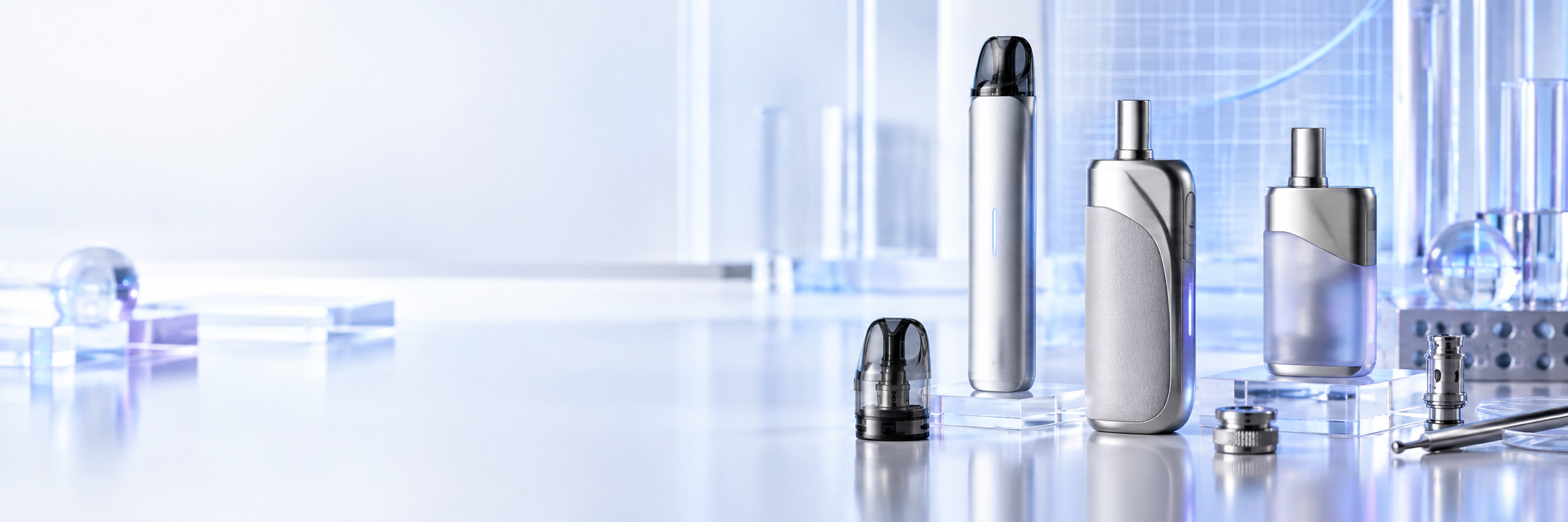 Adult vape devices, replacement pods and charging accessories arranged in a modern product studio.